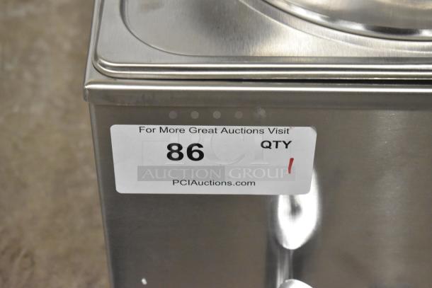 BRAND NEW KoolMore CFW-4T Countertop Food Warmer, stainless steel, scratch and dent, 110 Volts, 1 Phase, auction label visible.