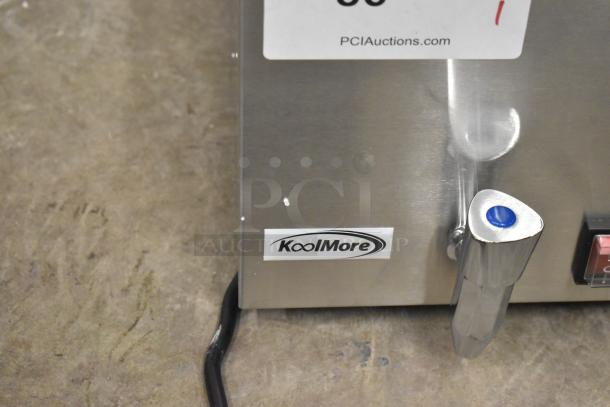 Brand new KoolMore CFW-4T countertop food warmer, 110 volts, 1 phase. Scratch and dent condition. Visible KoolMore logo.