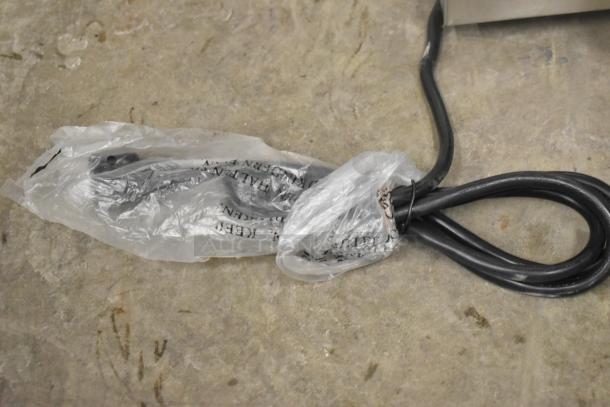 Brand new KoolMore CFW-4T countertop food warmer cable in plastic wrap, 110V, with slight cosmetic imperfections.