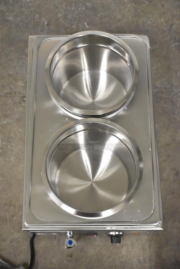 Brand new KoolMore CFW-4T countertop food warmer, stainless steel, dual compartments, 110 volts, with minor scratches.