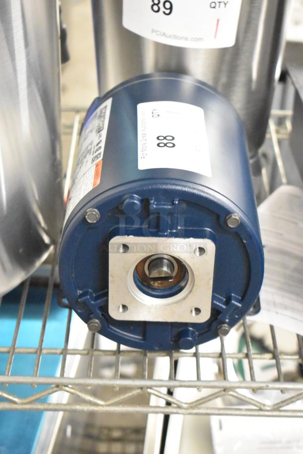 BRAND NEW Haight A4S17DZ39B motor, 115/230V, 1 phase, scratch and dent, visible auction label, blue finish.