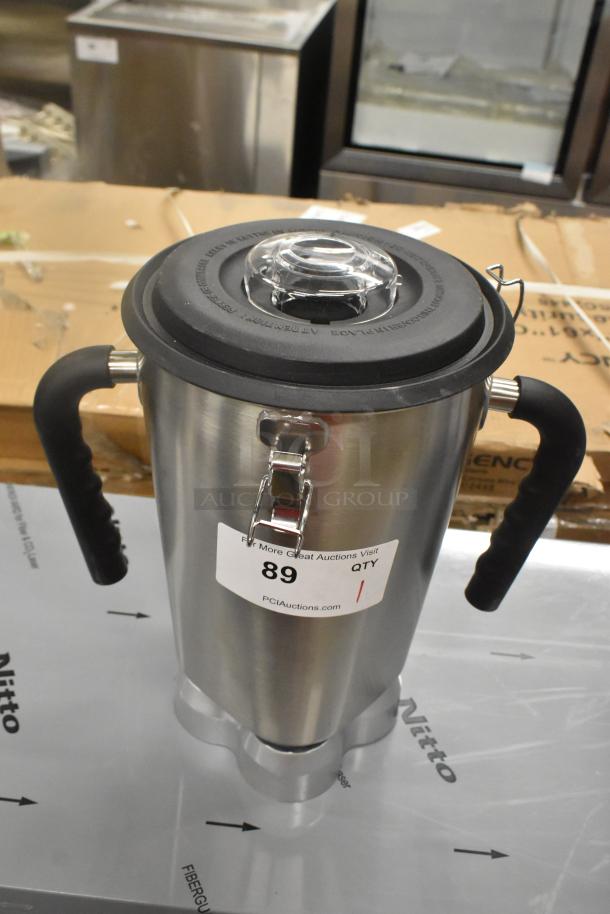 AvaMix stainless steel blender pitcher with black handles, brand new with minor scratches, visible label "89 QTY PCIauctions.com".