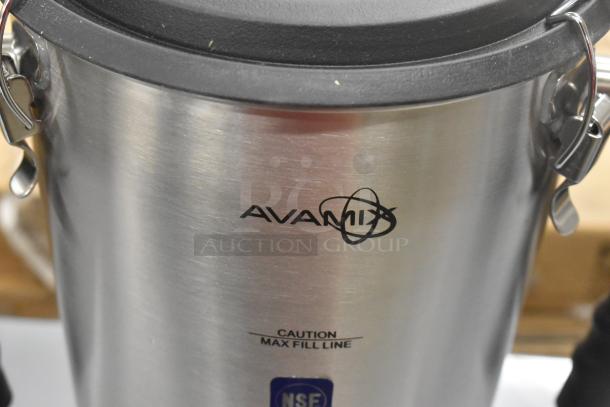 AvaMix Stainless Steel Blender Pitcher, brand new, scratch and dent, with locking lid. Features caution label for max fill line.