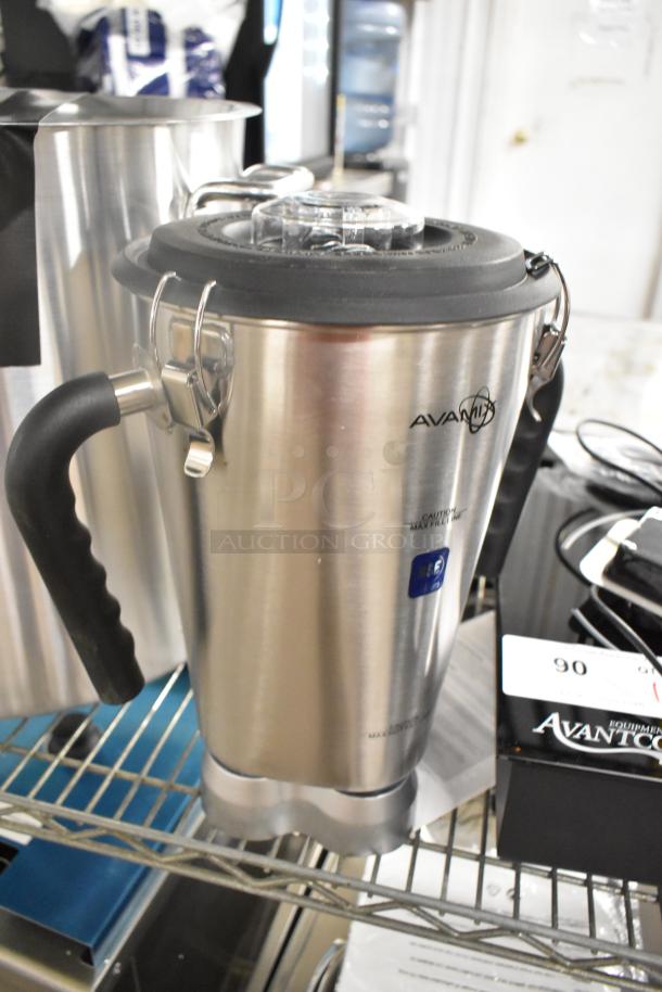 AvaMix Stainless Steel Blender Pitcher, brand new scratch and dent condition. Features sturdy handle and secure lid.