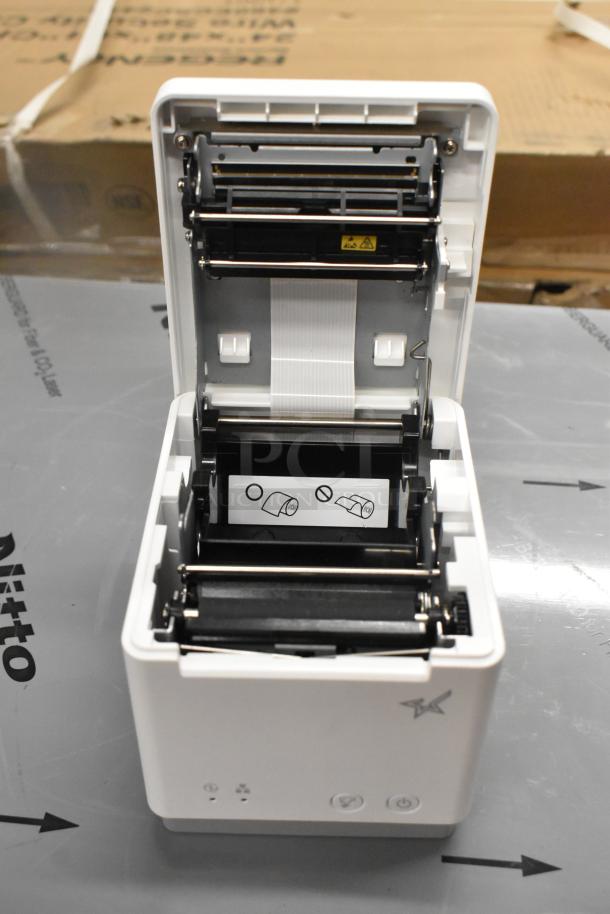 Brand new C-Print MCP20 WT US Receipt Printer with slight cosmetic damage. Open interior showing mechanism.