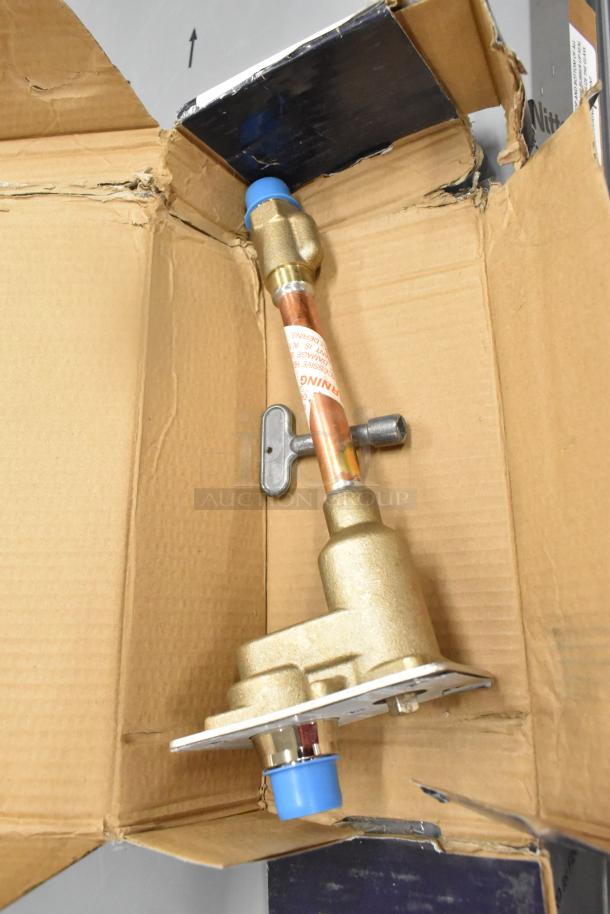 Brand new Zurn Elkay Z1321-CXL-8 wall hydrant with minor scratches; features copper and brass construction, visible warning label.
