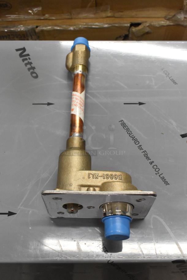 Brand new Zurn Elkay Z1321-CXL-8 wall hydrant, labeled as scratch and dent, with visible copper piping and protective caps.