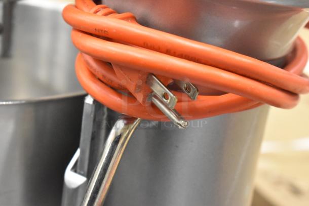 KitchenAid KSM8990CU countertop mixer, shown with red power cord and attachments. High-performance, 8-quart capacity.