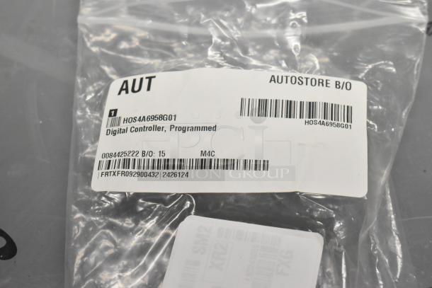 Hoshizaki 4A6958G01 Digital Controller in clear packaging, labeled as programmed, new condition.