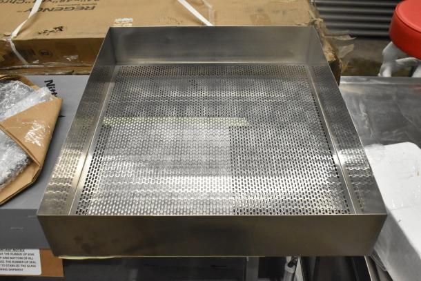 Giles 30261 Pan Sifter Bbt, perforated stainless steel, new condition, packaged with cardboard and plastic wrap.