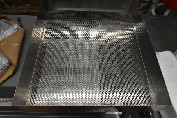 Metal pan sifter with perforated surface, new condition. Part of 4-item auction including fan blade, controller, program, and knife.