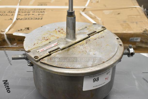 Two used popcorn kettles for popcorn machines, metal construction with visible wear, labeled "98" from PCIauctions.com.