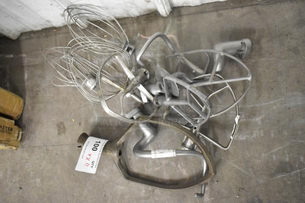 11 various mixer attachments including pastry, 4 paddles, 3 dough hooks, 3 whisks; metal, used condition, lot 11X bid.