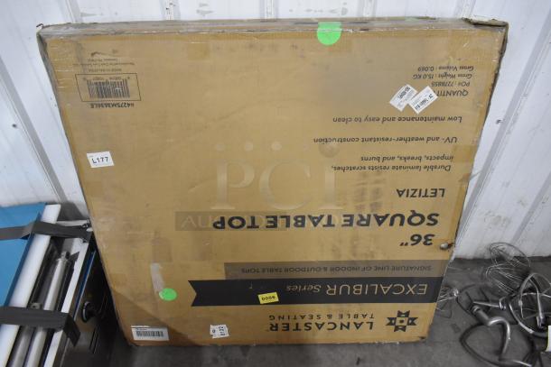 Boxed Lancaster Table & Seating Excalibur 36" x 36" Square Table Top with Letizia Finish, minor packaging damage visible.