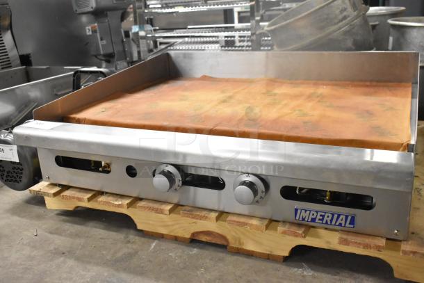 Brand new Imperial ITG-36LP 36" propane griddle, thermostatically controlled, 90,000 BTU, stainless steel, scratch and dent.