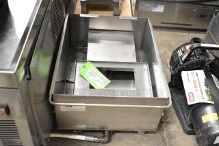 BRAND NEW SCRATCH AND DENT! Oil Grease Trap with Frymaster 2025 Flue Assembly Model 1080437, visible tags with item details.