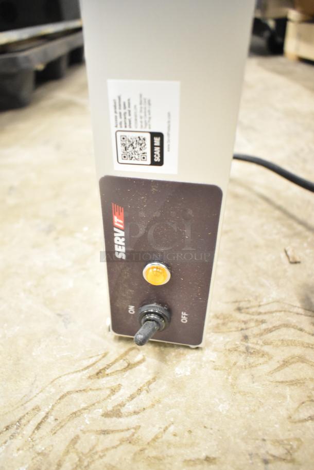 Brand new ServIt 423SW48TLCPA 48" strip warmer, lighted with single toggle control. Scratch and dent. 120V, 1 phase.