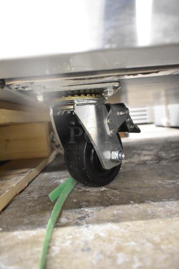 Brand new Avantco 178CBE52HC commercial chef base wheel detail. Scratch and dent condition, 115V, 1 phase.