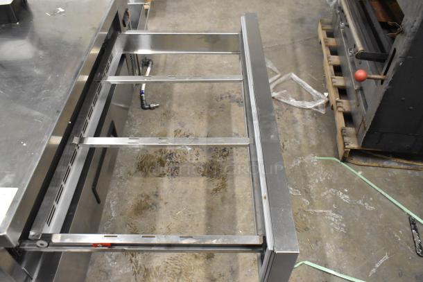 Avantco 178CBE52HC Commercial Chef Base, 2 Drawer, 115V, New with scratches, stainless steel, open drawer view.