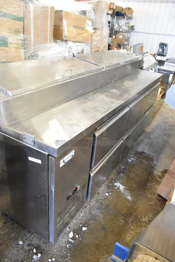 Brand new Avantco commercial pizza prep table with 6 drawers, visible dents. 115 volts, 1 phase, stainless steel.