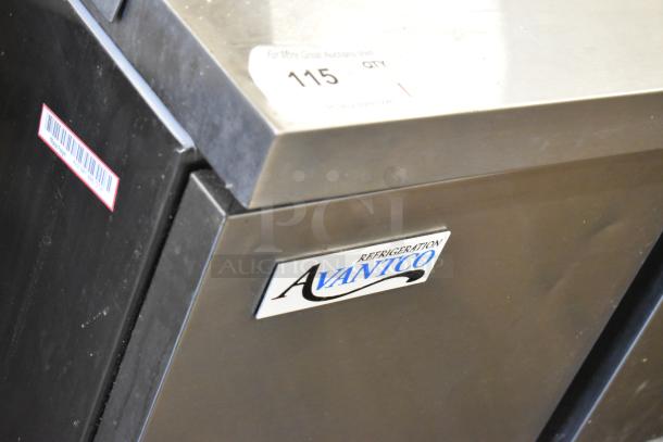 Brand new Avantco commercial pizza prep table with 6 drawers, visible scratch and dent, 115 volts, 1 phase, Avantco logo.