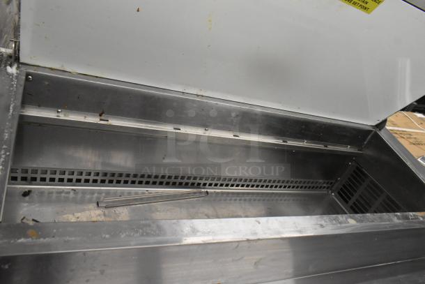 BRAND NEW SCRATCH AND DENT! Avantco commercial pizza prep table, 6 drawers, 115V, 1 phase, visible scratches and marks.