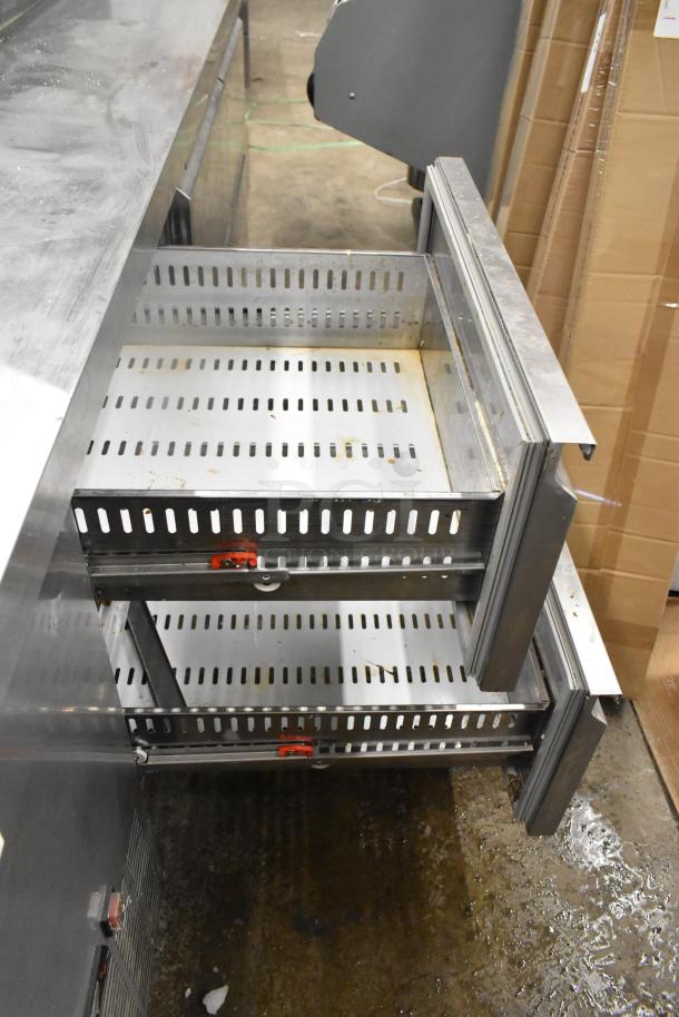 Brand new Avantco commercial pizza prep table with six drawers, showing minimal scratches. 115 Volts, 1 Phase.