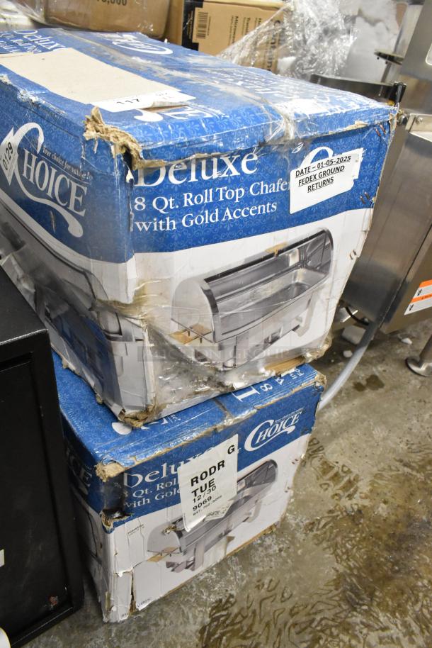 Two new Choice Deluxe 8 Qt. roll top chafers with gold accents in damaged boxes. Boxes show wear and shipping labels.