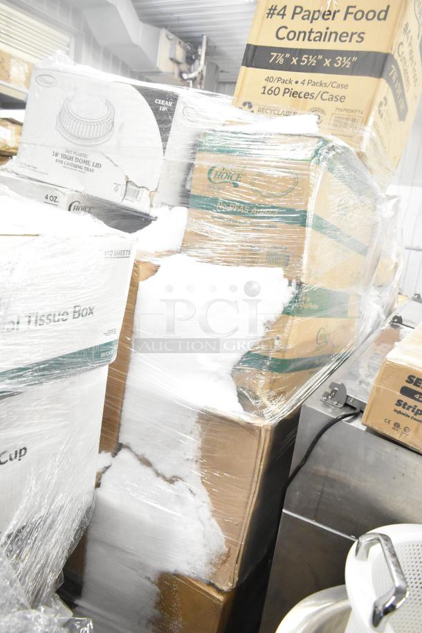 Pallet of 28 new scratch and dent items wrapped in plastic, including boxes of towels and portion cups, visible labels indicate size and quantity.