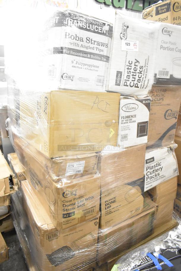 Boxes containing 21 brand new scratch and dent items including portion cups, cold cups, and napkin bands, wrapped on a pallet.