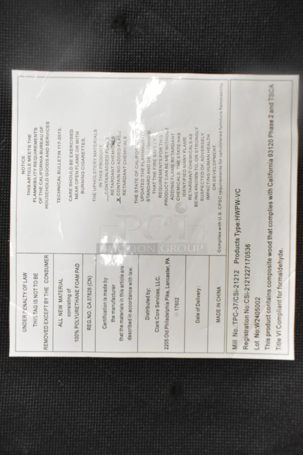 Black metal stool with red seat cushion, brand new with minor scratches and dents, 100% polyurethane foam pad, compliance label visible.