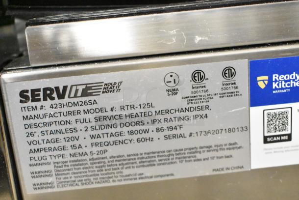 Alt text: 

ServIt 423HDM26SA heated display case tag, showing stainless steel, 120V, 1800W, IPX4, 26" with sliding doors.