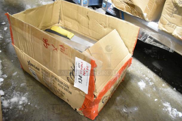 Open cardboard box containing 85 sharpened stainless steel knives, including a chef knife. Box labeled "10" Medium Cook."