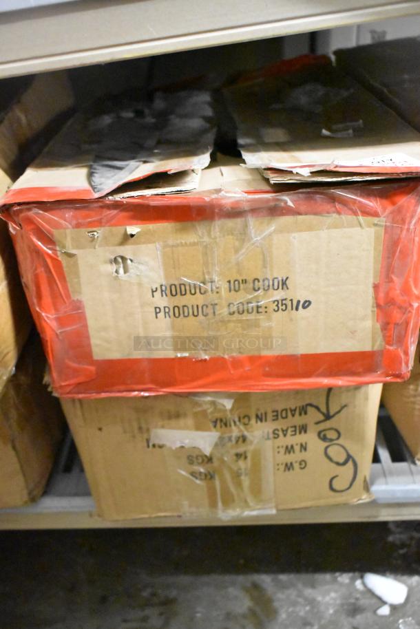 Box of 120 sharpened stainless steel knives, including chef knife. Product code 35110, labeled "10" Cook". Box is worn.