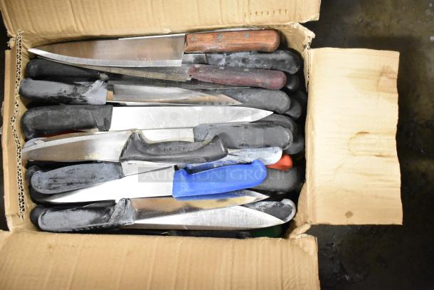 Box of 120 sharpened stainless steel knives, including various chef knives. Mixed handle colors, visible wear.