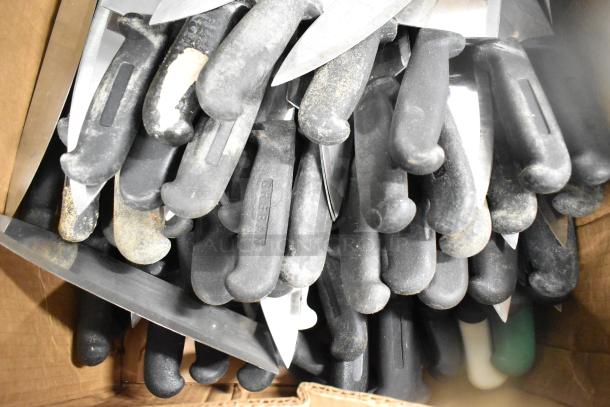 Box of 200 sharpened stainless steel knives, including chef and serrated knives, with black handles. Mixed condition.