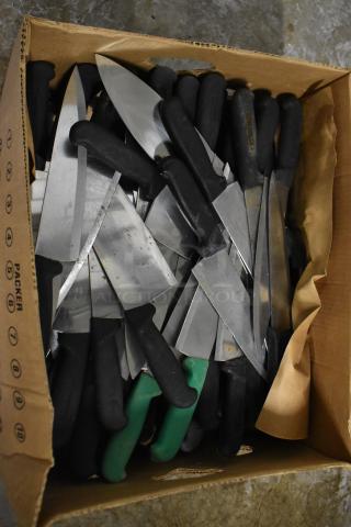 Box of 150 sharpened stainless steel knives with black and green handles, includes chef knives.