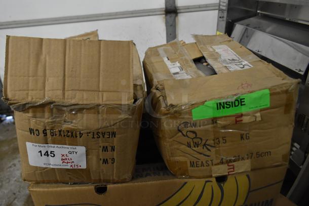 Cardboard boxes containing 150 sharpened stainless steel knives, including a chef knife. Labels show quantity and dimensions.