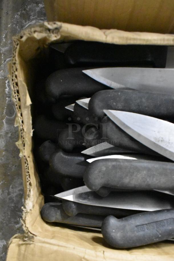 Box of 150 sharpened stainless steel knives with black handles, including chef knives, in excellent condition.