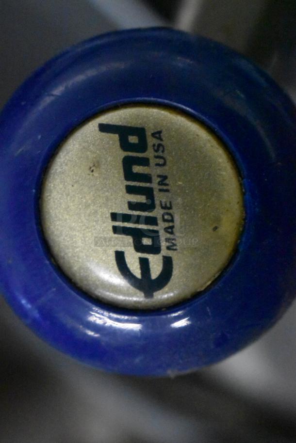 Edlund commercial can opener knob with "Made in USA" marking, part of a set of 7 can openers with mounts.