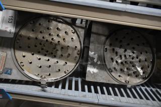 4 Pelican heads with blades, 2 for grating and 2 for slicing, no front pieces. Auction lot, quantity 4.