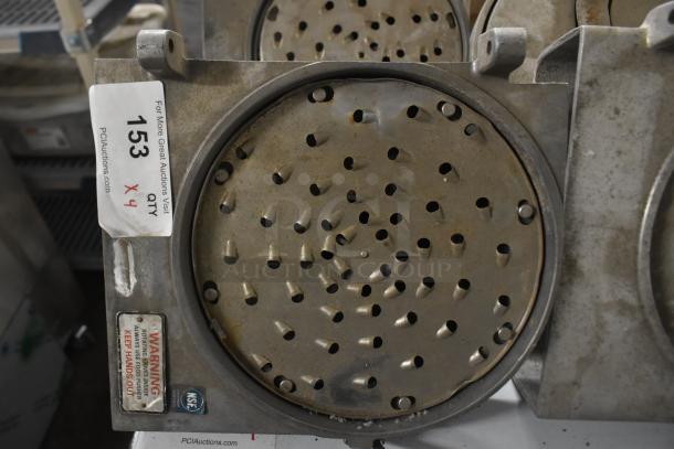 4 Pelican heads with blades; 2 grating and 2 slicing. Metal construction, no front pieces. Auction lot tag visible, marked "153 x4". Warning and NSF labels present.