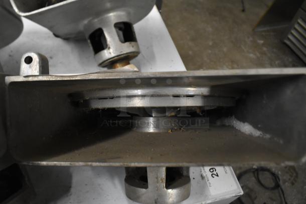 Four pelican heads with blades; 2 grating and 2 slicing, no front pieces, visible wear, sold as four times your bid.