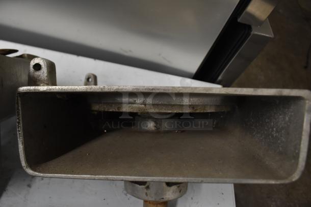 Four pelican heads with blades for grating and slicing, no front pieces, metal condition, industrial use.