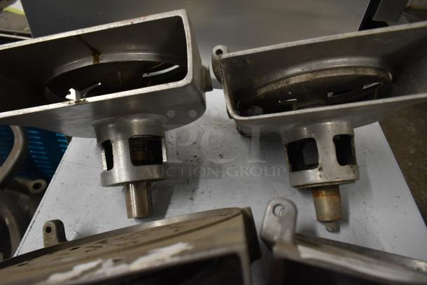 4 metal pelican heads with blades, 2 grating, 2 slicing, no front pieces, visible wear, auction item.