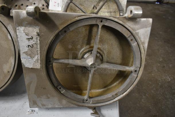 Four pelican heads with two blades for grating and slicing, missing front pieces, used condition with visible wear.