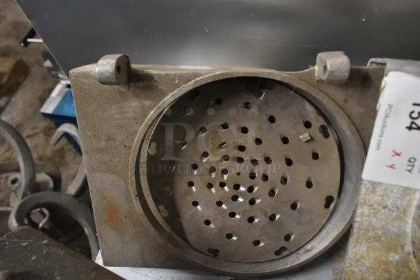 Four pelican heads with two blades for grating and slicing. No front pieces included. Auction label indicates lot "x4".