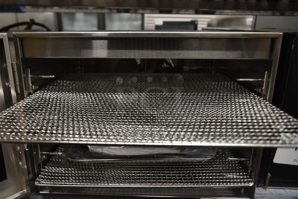 Avantco 177LT06A 6 tray stainless steel food dehydrator, glass door, scratch and dent, works only at highest heat setting.