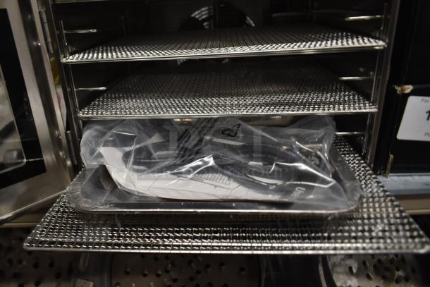 Brand new Avantco 177LT06A 6-tray stainless steel food dehydrator with glass door. Works on highest heat setting only.