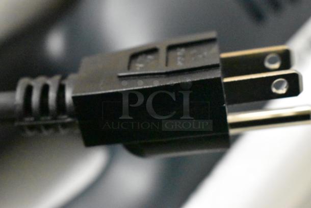 Close-up of the power cord plug for a 2024 AvaMix 928IBHDW10 Heavy-Duty Immersion Blender, 120 Volts, 1 Phase.